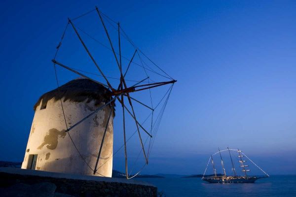 Greece, Mykonos, Hora Windmill and luxury yacht